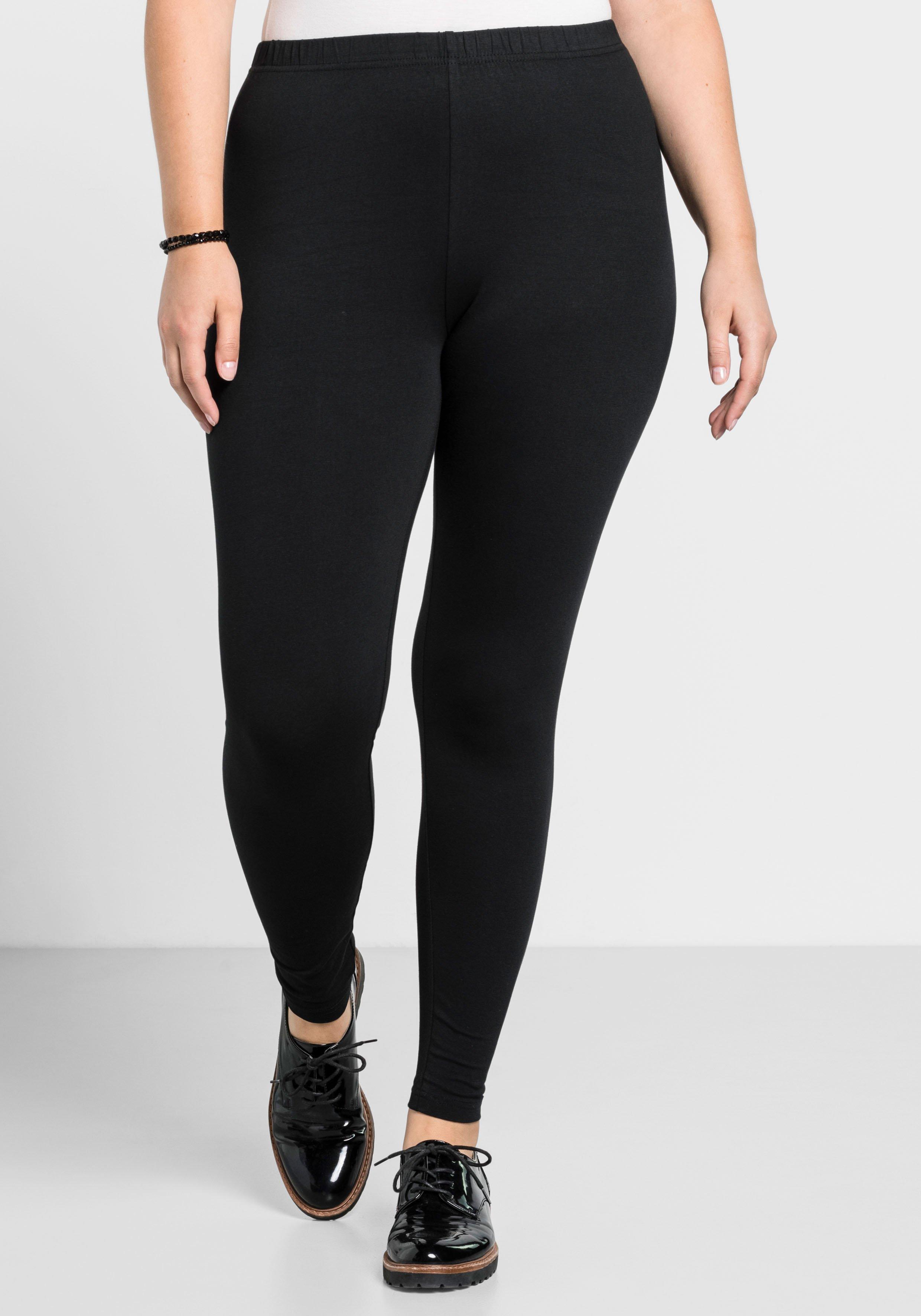 Leggings in Lederoptik, mit Schlitz am Saum - schwarz