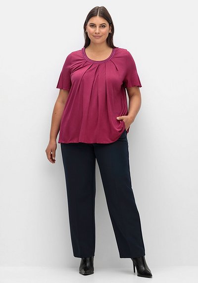 Shirt in A-Linie mit dekorativer Blende, aus Viskose-Jersey - schwarz |  sheego