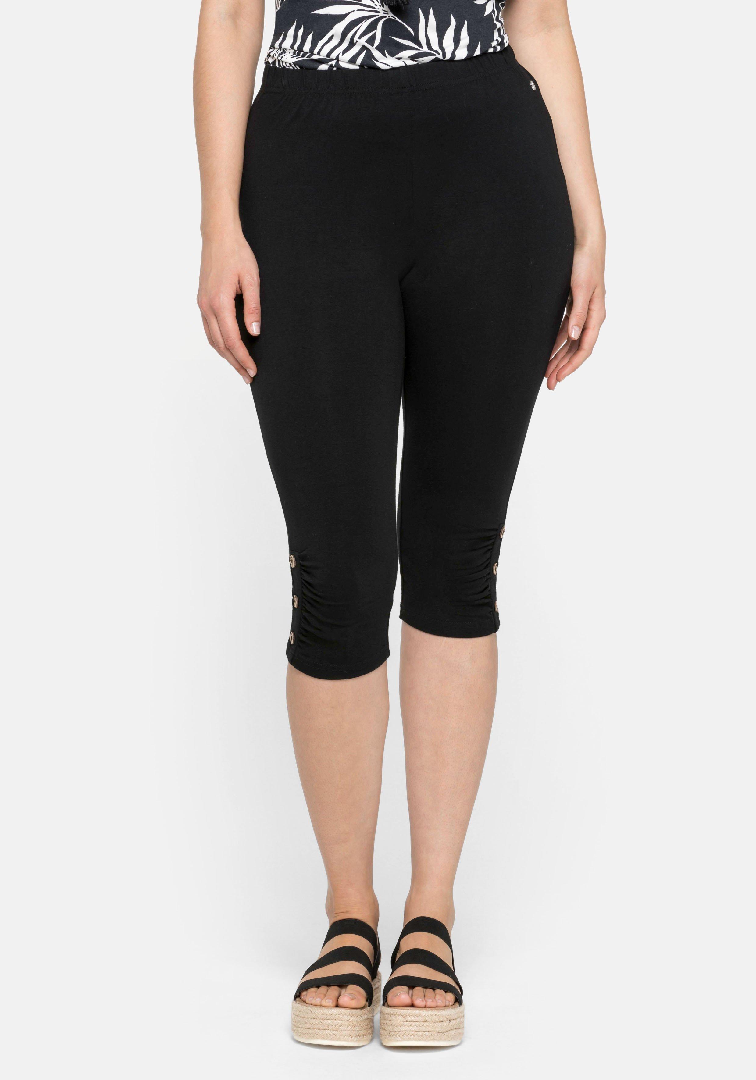 sheego Caprileggings mit Raffung und Deko-Knöpfen am Saum - schwarz sheego