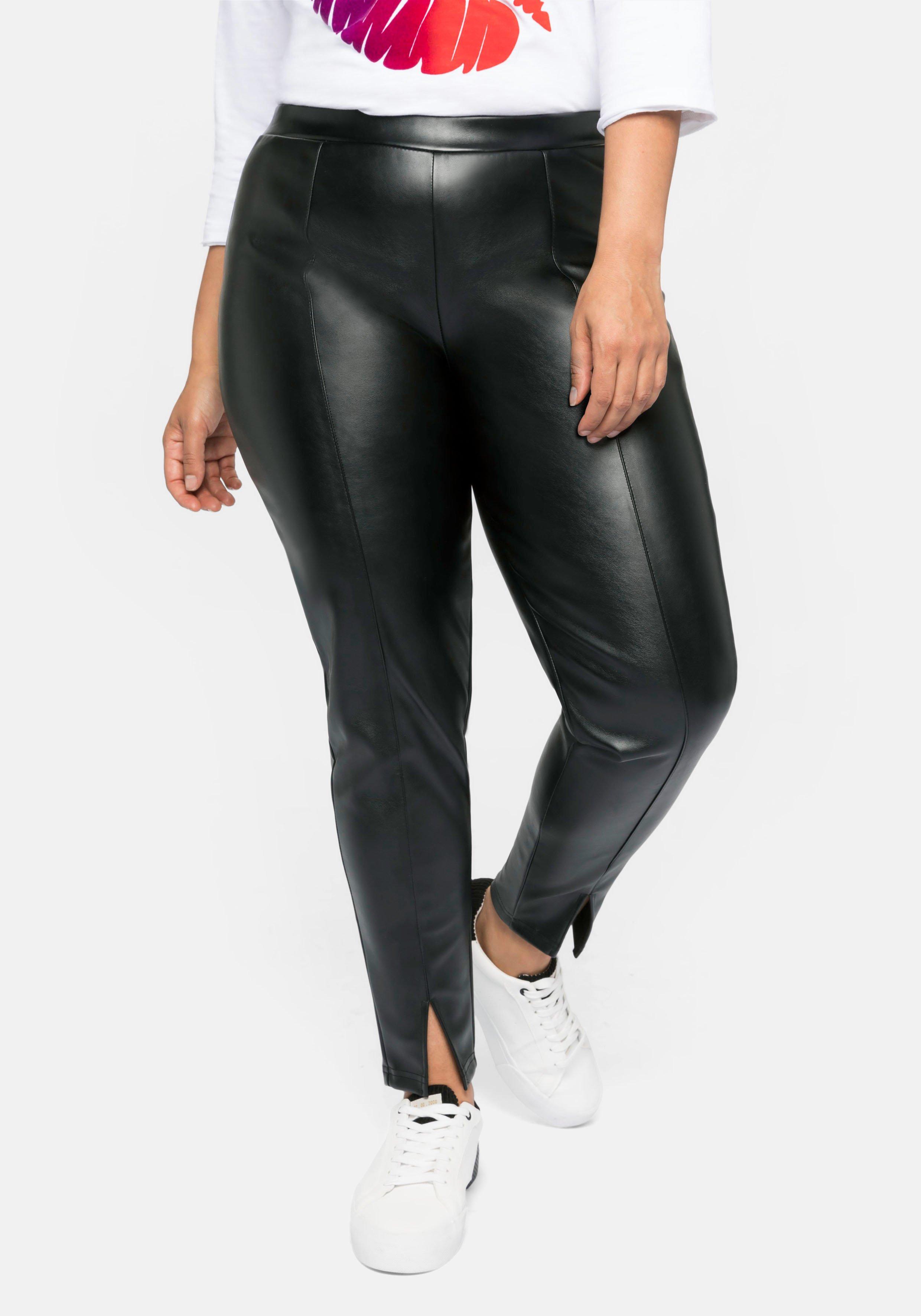 Leggings in Lederoptik, mit Schlitz am Saum - schwarz | sheego