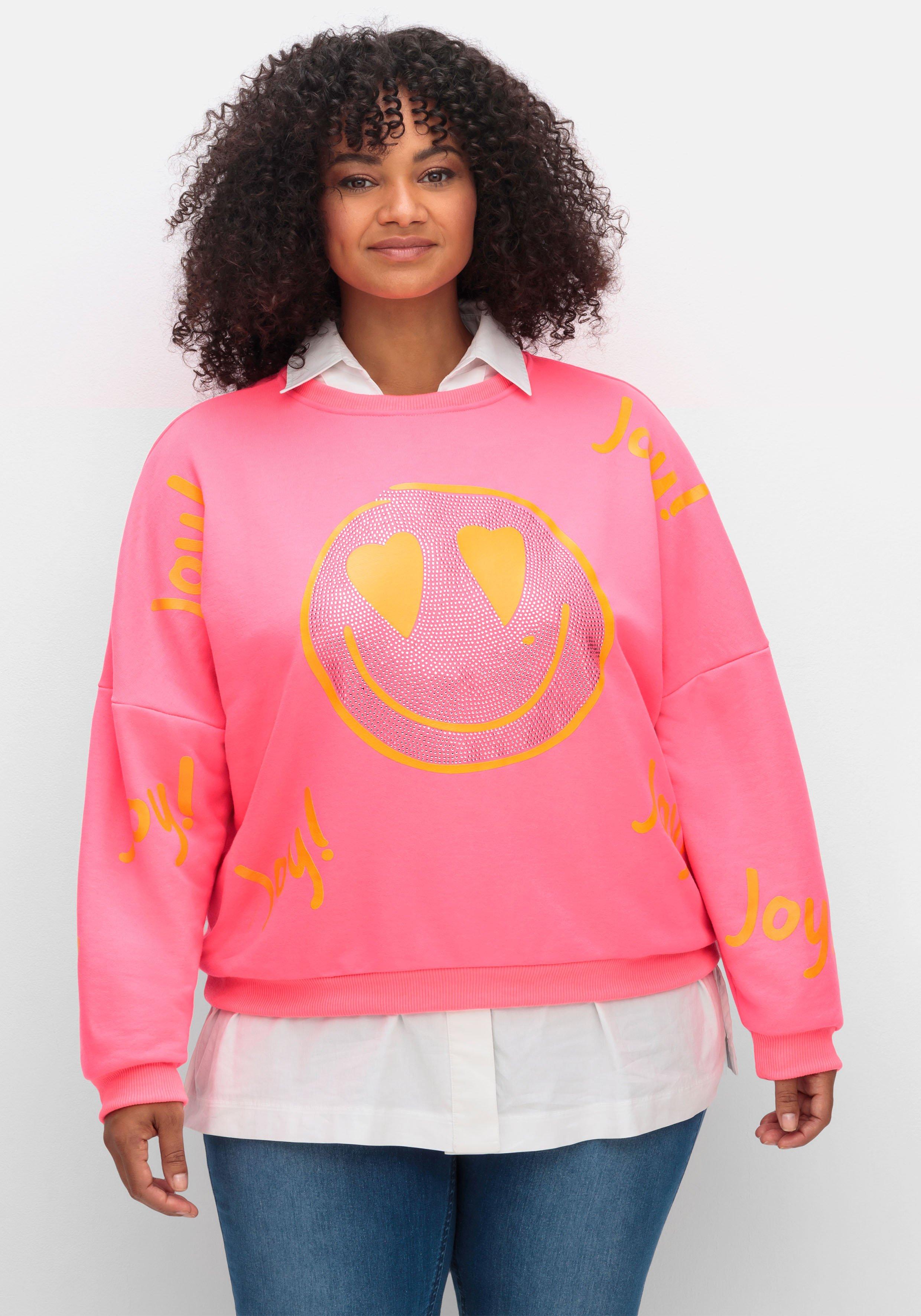 Sweatshirt mit Smiley-Frontdruck und Glitzersteinen - pink | sheego