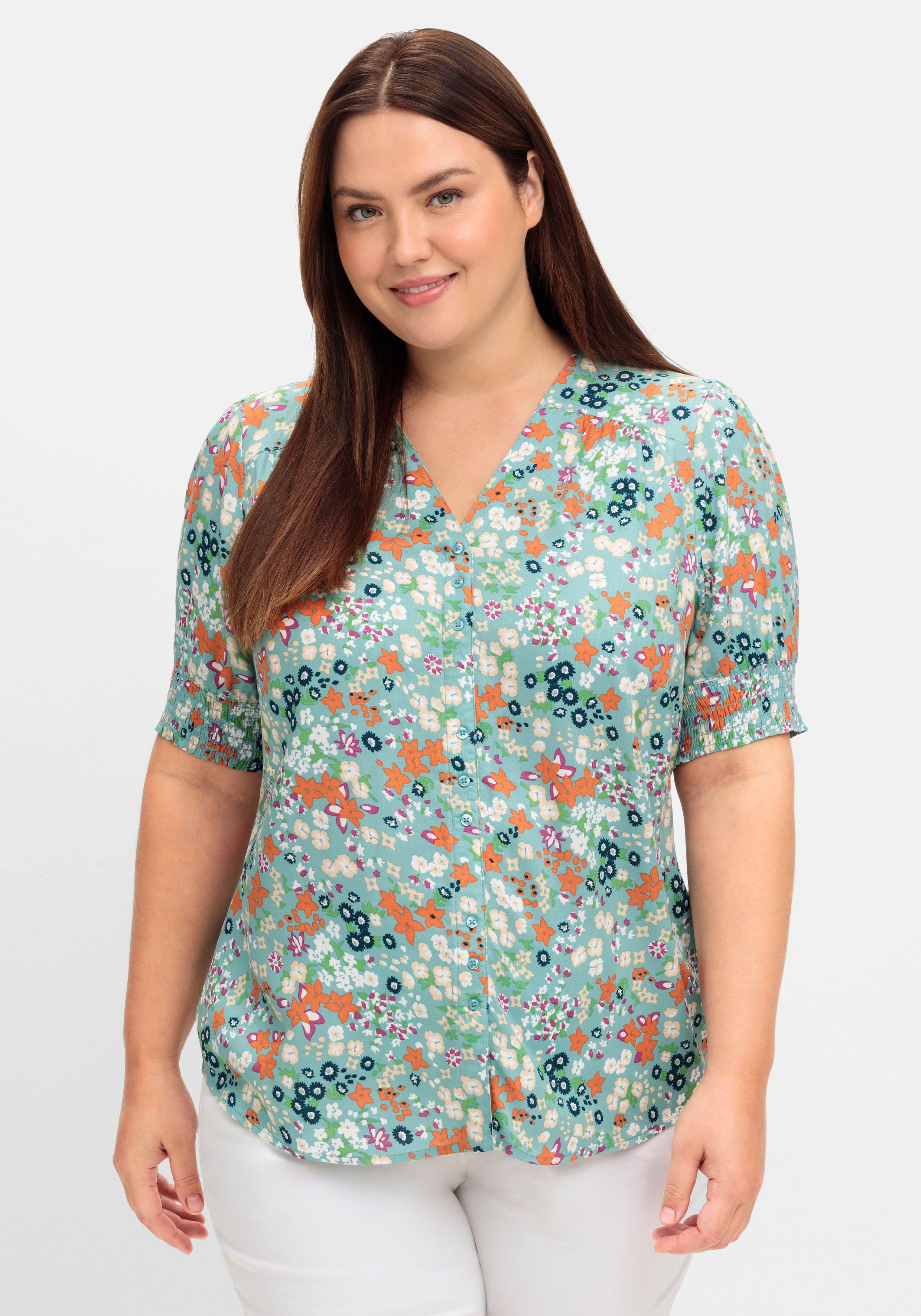 sheego Bluse mit V-Ausschnitt und Allover-Blumenprint - tiefgrün gemustert sheego