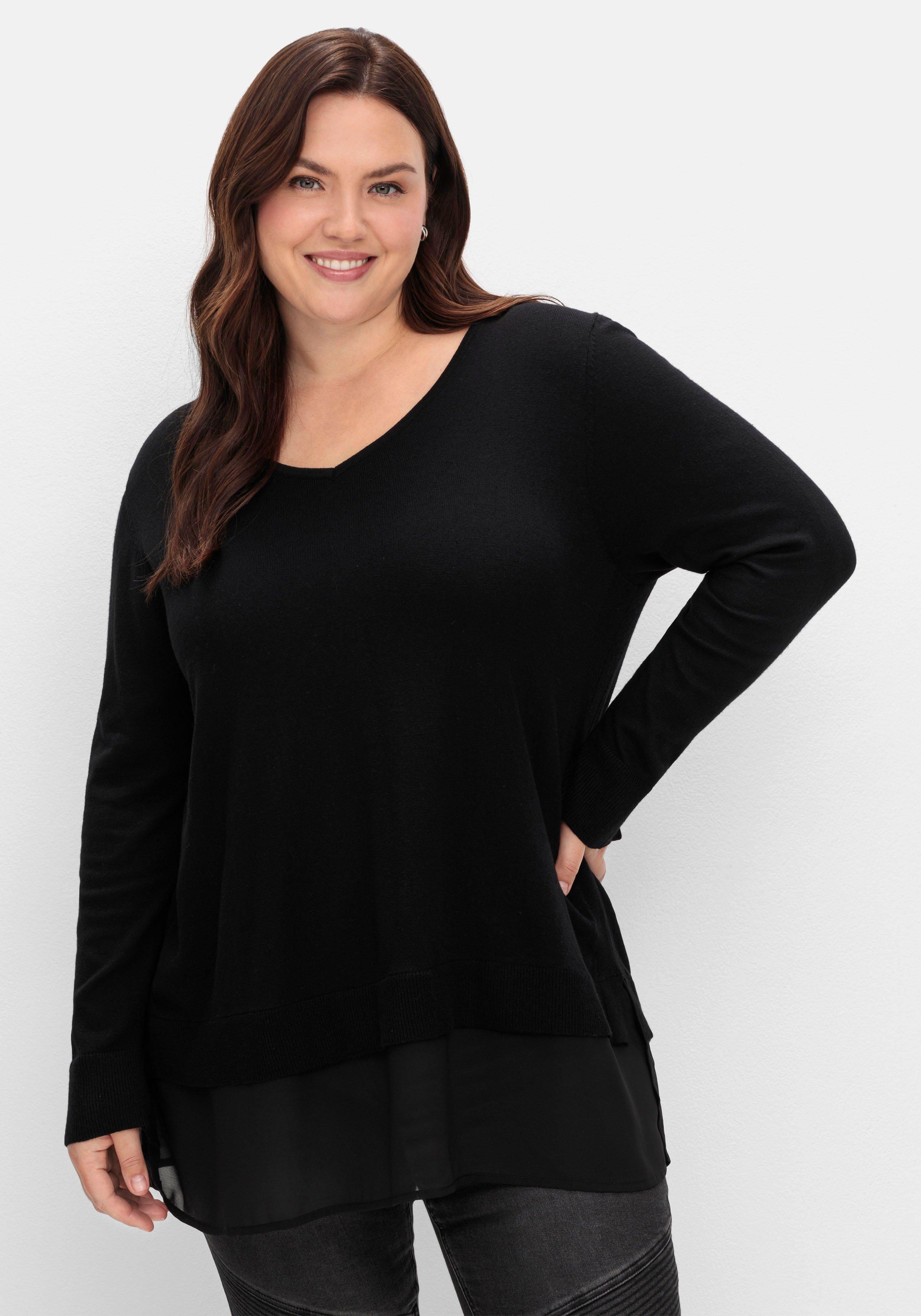 sheego Pullover in A-Linie, mit Chiffonbesatz am Saum - schwarz sheego